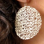 Off white earring made of recycled plastic bags